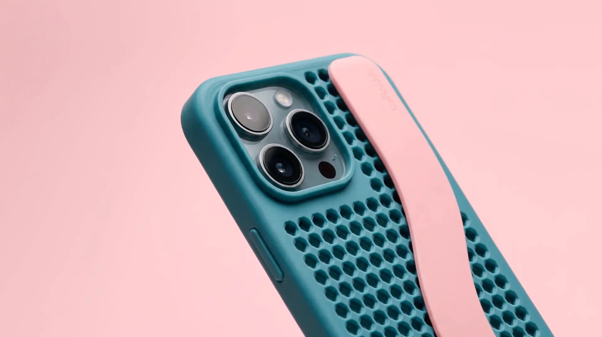 Model seated against a teal backdrop holding the phone case